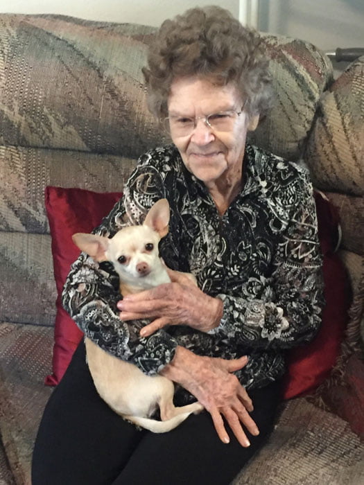 Photo of Ellis County Meals on Wheels client Minnie and her dog Baby