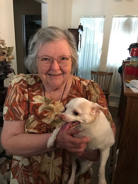 Photo of Ellis County Meals on Wheels client Wanda and her dog Pepe