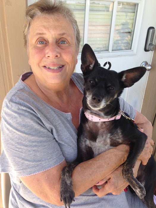 Photo of Ellis County Meals on Wheels client and her dog