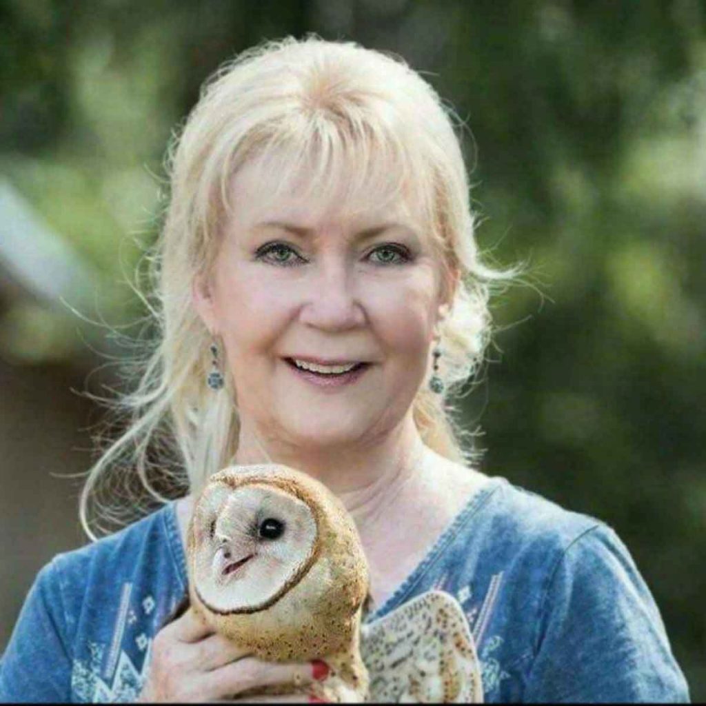 Kathy Rogers with an owl